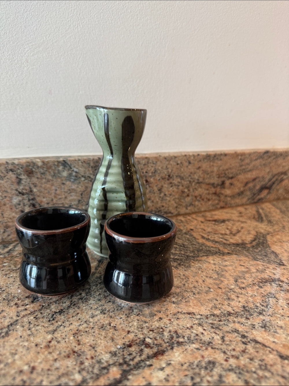 Sake set. Pier one. No chips or defects.